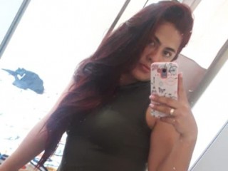 DanielaDurann webcam girl as a performer. Gallery photo 1.