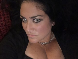 SaintSage webcam girl as a performer. Gallery photo 3.