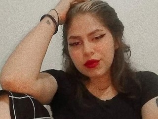 CoralineBlake webcam girl as a performer. Gallery photo 1.