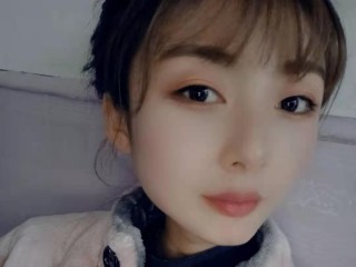 Xinxinwang webcam girl as a performer. Gallery photo 1.
