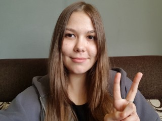 TrishaXMoore webcam girl as a performer. Gallery photo 1.