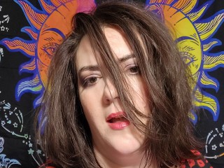 SpellboundSage webcam girl as a performer. Gallery photo 2.