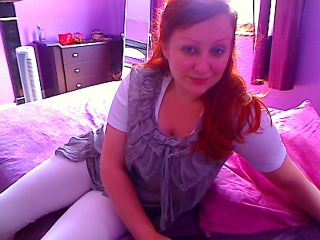 TouchMeNow webcam girl as a performer. Gallery photo 1.