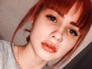 Aprille webcam girl as a performer. Gallery photo 1.