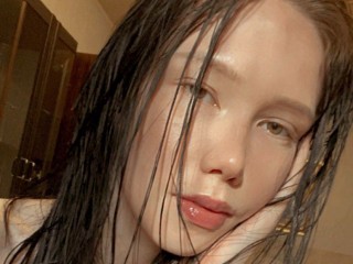 lily_lo webcam girl as a performer. Gallery photo 2.