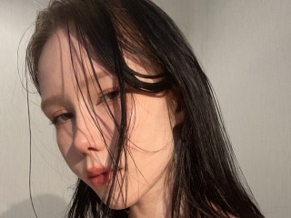 lily_lo webcam girl as a performer. Gallery photo 3.